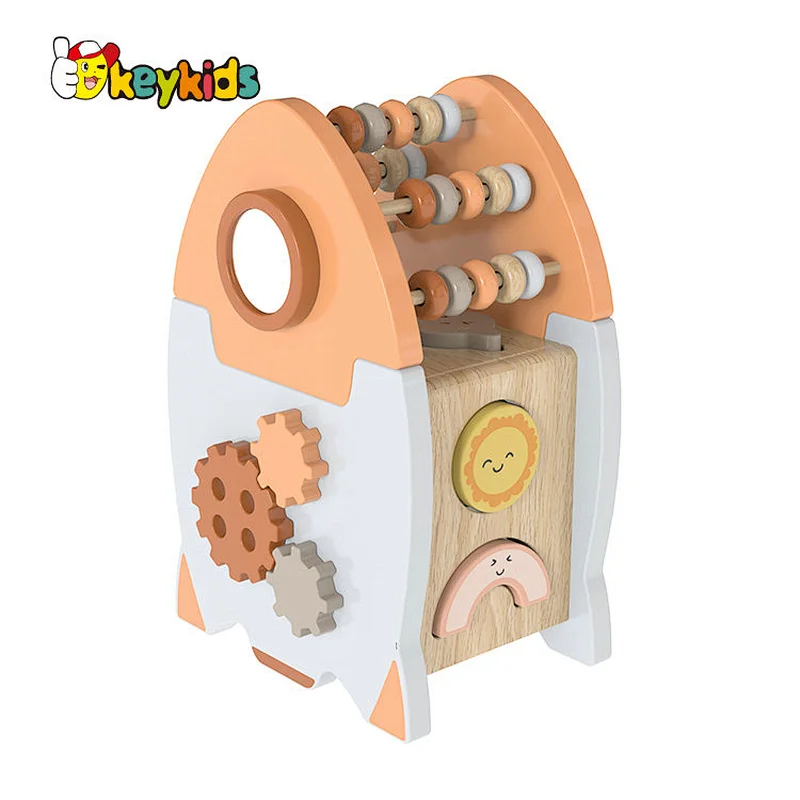 Educational Montessori wooden rocket shaped activity cube for children or toddlers W12D448