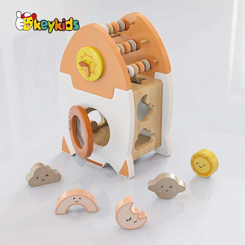 Educational Montessori wooden rocket shaped activity cube for children or toddlers W12D448