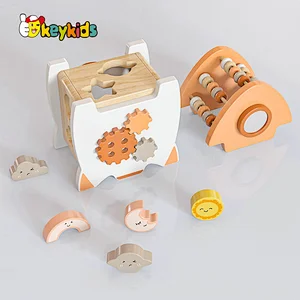 Educational Montessori wooden rocket shaped activity cube for children or toddlers W12D448