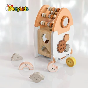 Educational Montessori wooden rocket shaped activity cube for children or toddlers W12D448