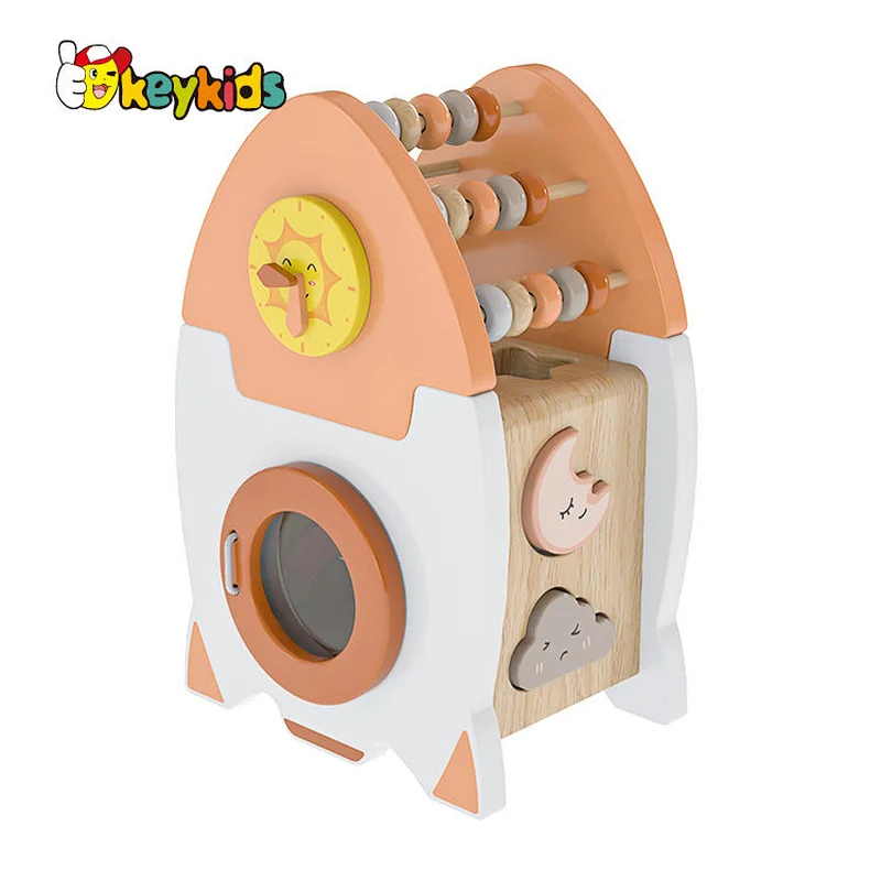 Educational Montessori wooden rocket shaped activity cube for children or toddlers W12D448